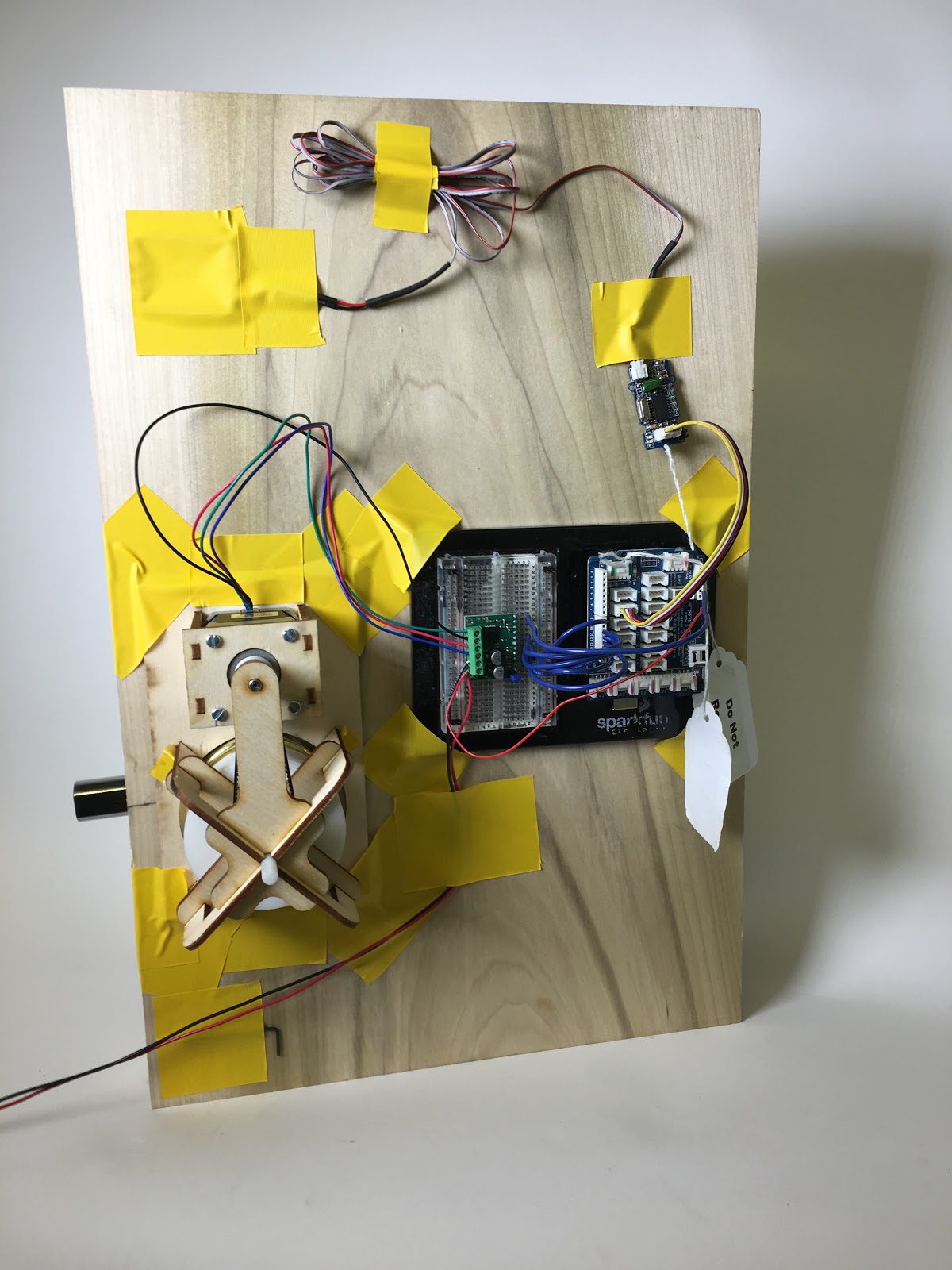 Device mounted on testing board with breadboarded electronics